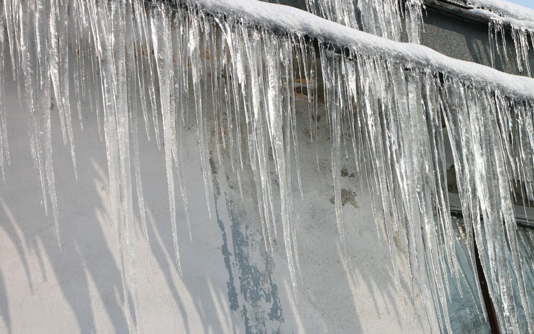 How Can I Prevent and Remove Damaging Ice Dams on My Roof?